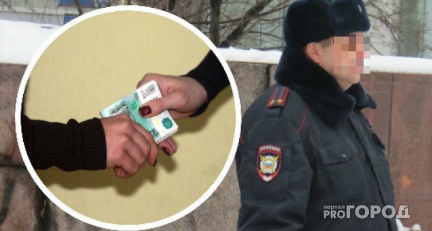 В Коми полицейскому дали взятку под видеокамерой