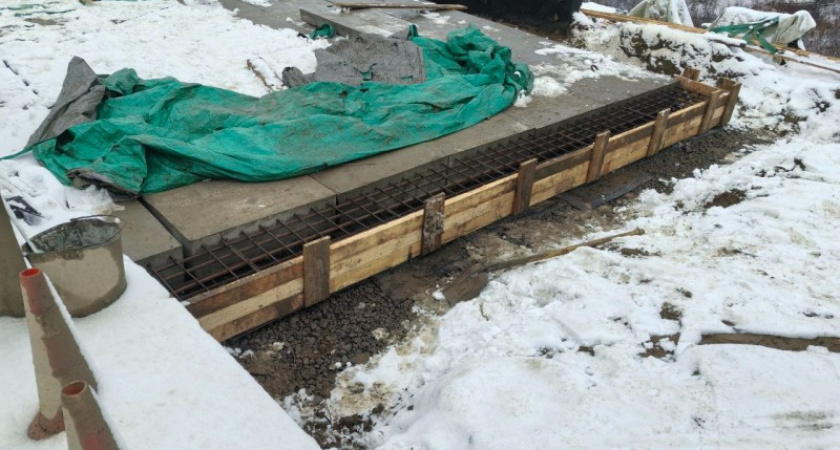 В Коми продолжаются работы по капитальному ремонту моста через Турунъель