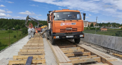 Ремонт моста через реку Ухта в Коми стартовал с фрезерования покрытия